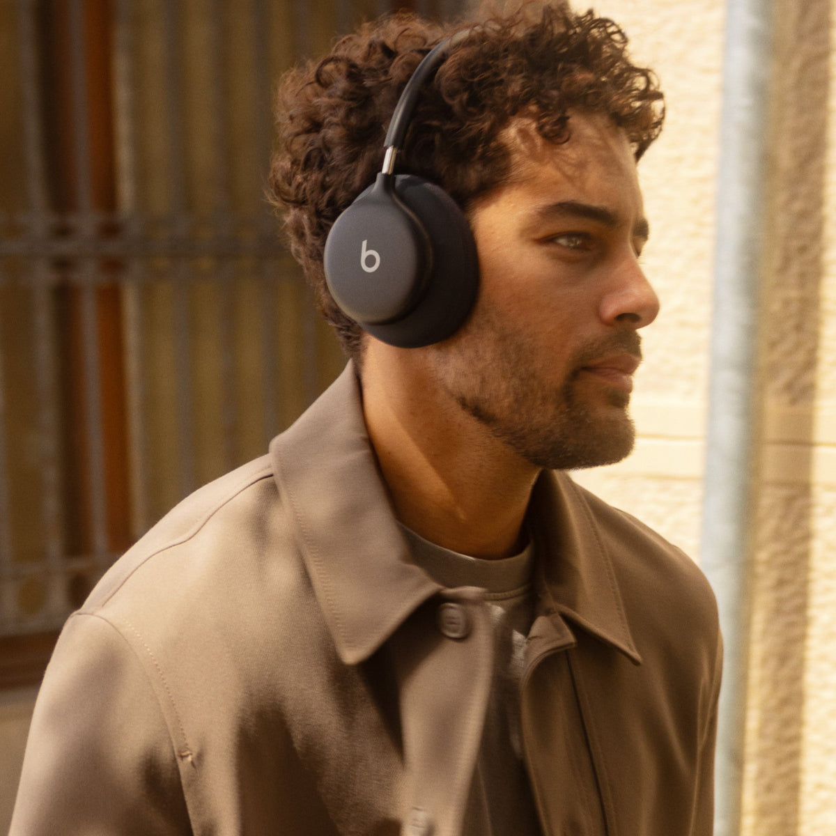 Person wearing Beats 360 headphones in Black
