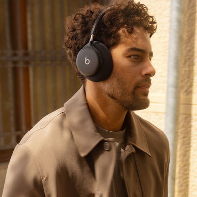 Person wearing Beats 360 headphones in Black 